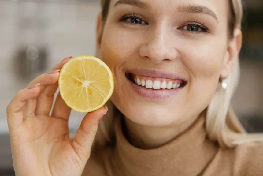 teeth whitening with lemon and baking soda at top smile dental clinic in dubai